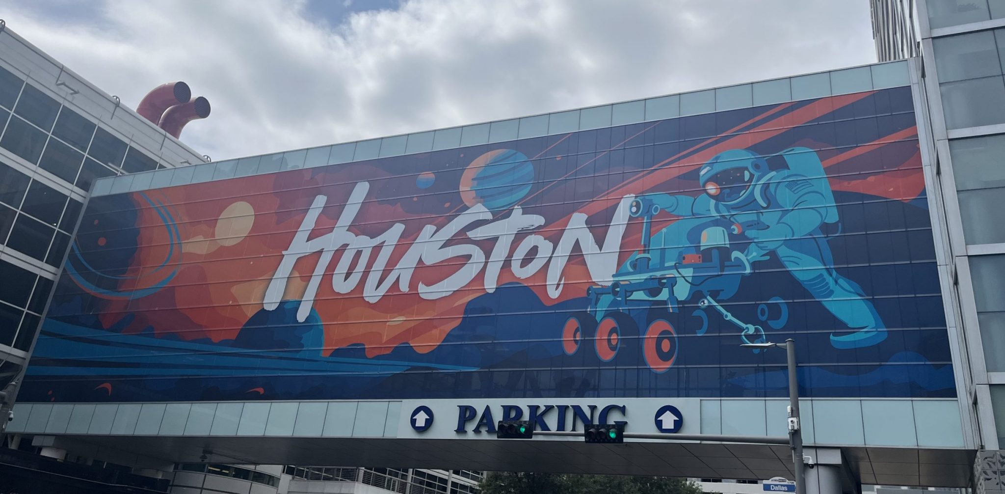 Mural featuring the word "Houston" with an astronaut 