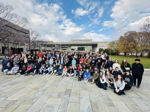 group posing in front of the National Constitution Center. 