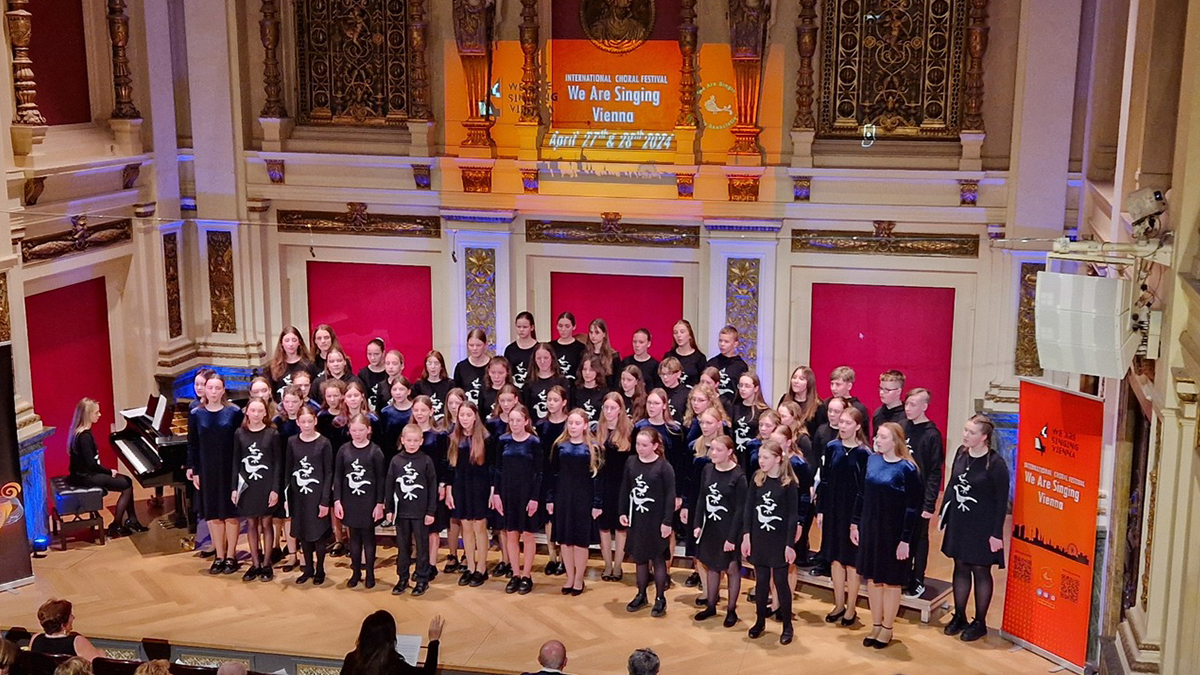 choir singing in a concert hall